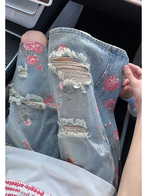 Floral print ripped denim shorts for men