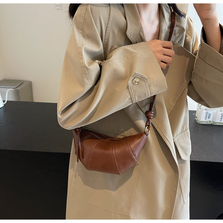 Crossbody cow horn bag