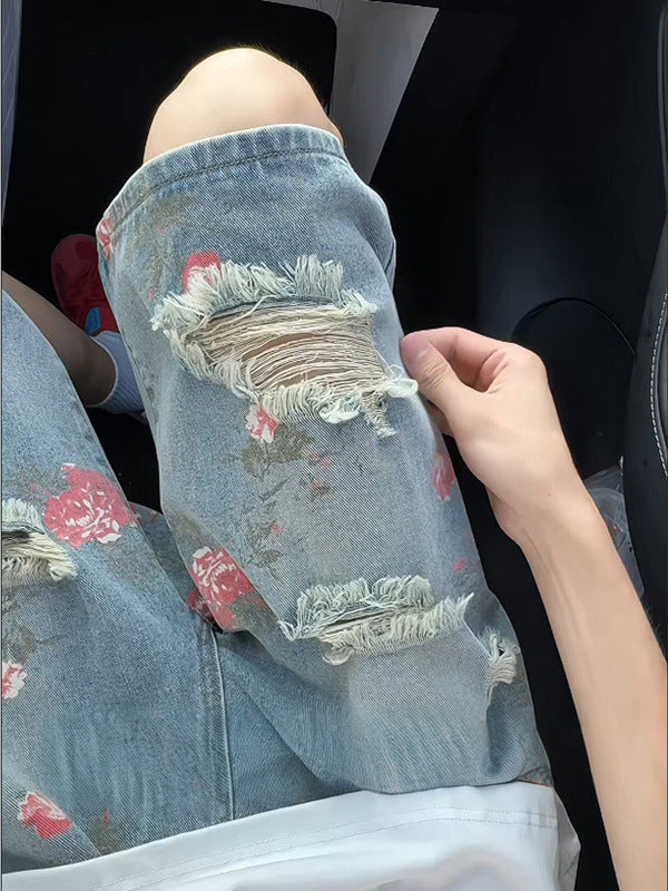 Floral print ripped denim shorts for men