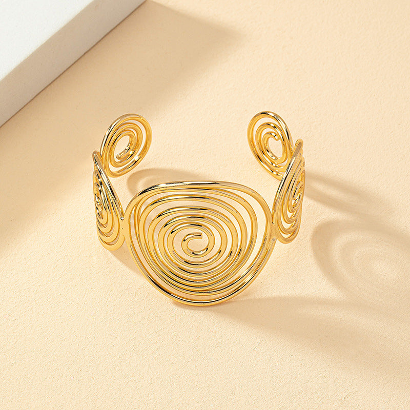 High-end geometric bangle