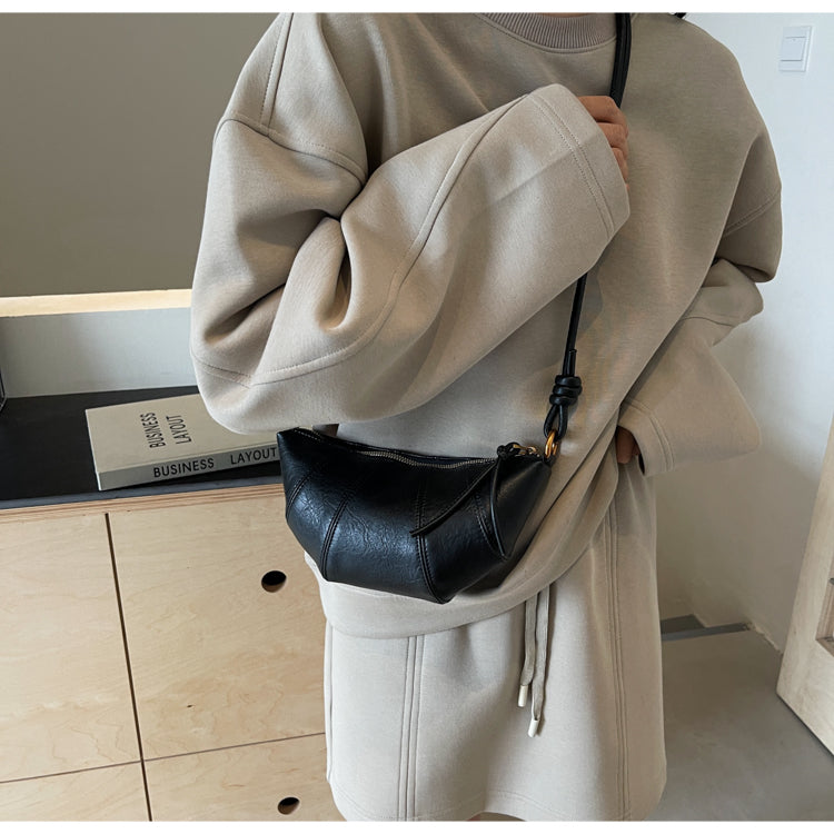 Crossbody cow horn bag