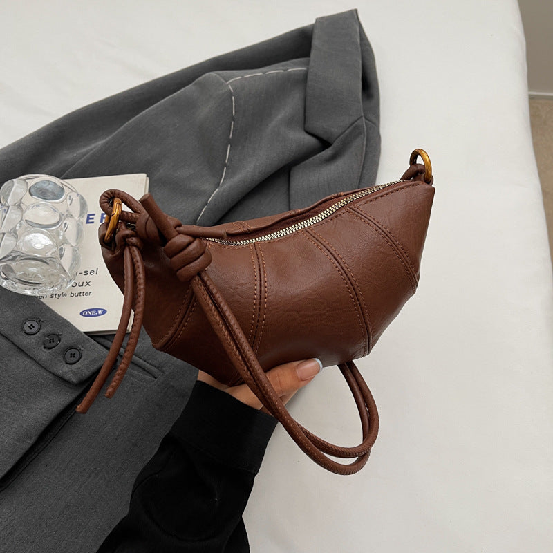Crossbody cow horn bag