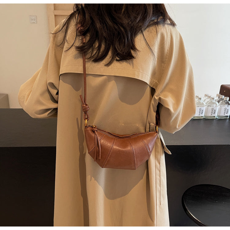 Crossbody cow horn bag