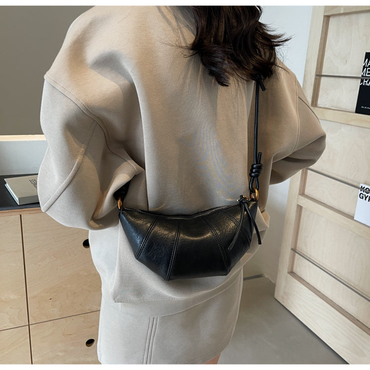 Crossbody cow horn bag