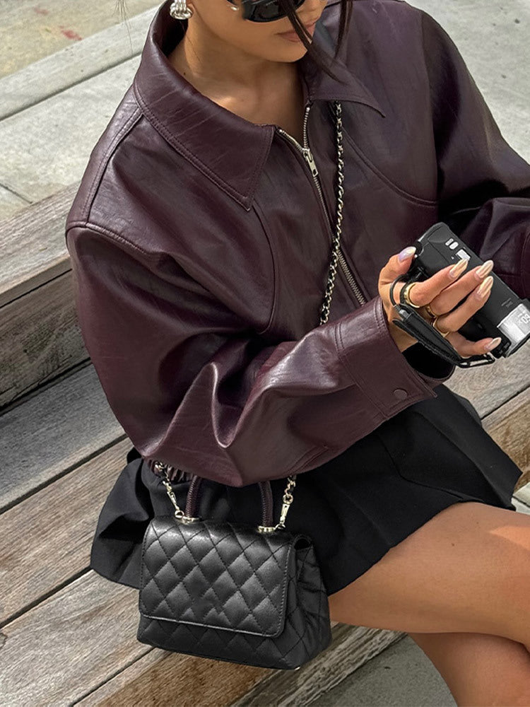 Strap up short long sleeved jacket