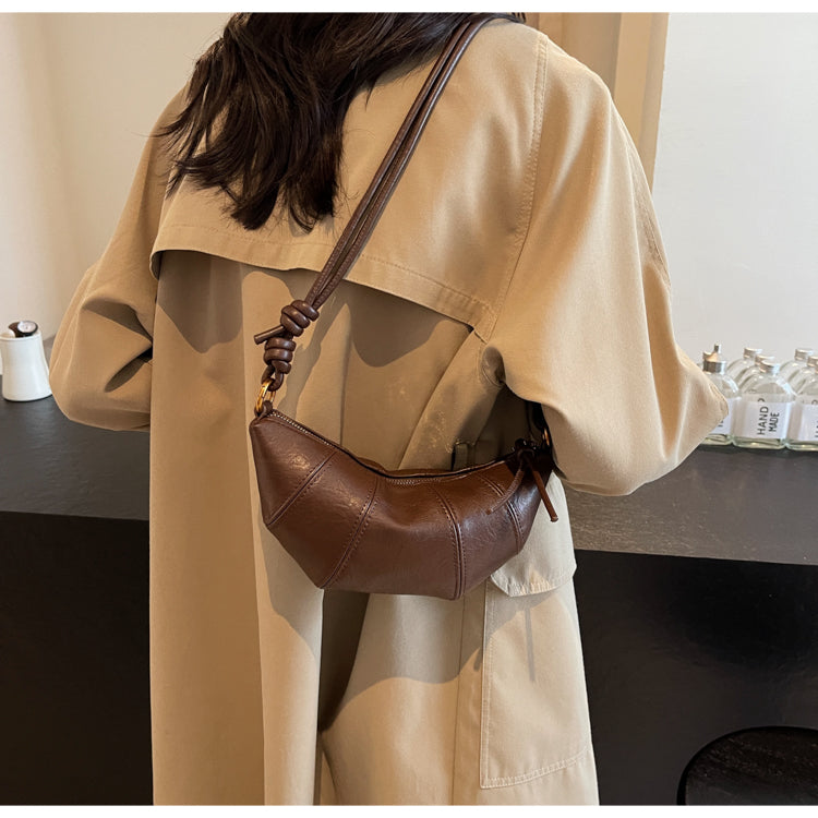 Crossbody cow horn bag
