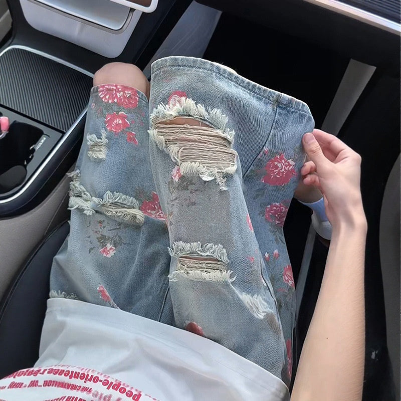 Floral print ripped denim shorts for men