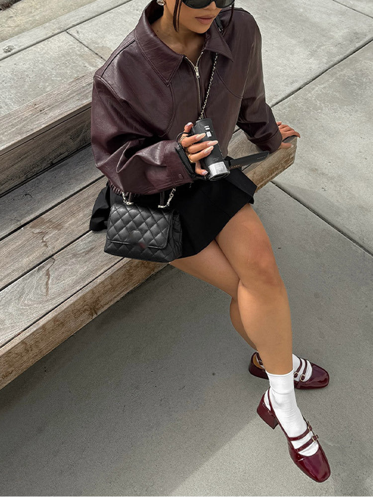 Strap up short long sleeved jacket