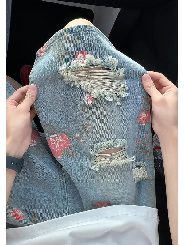 Floral print ripped denim shorts for men