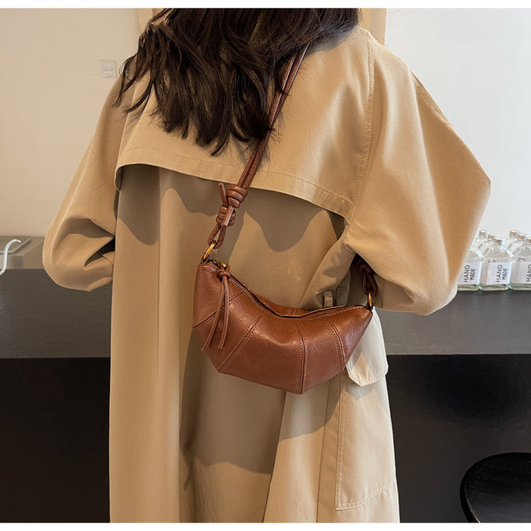 Crossbody cow horn bag