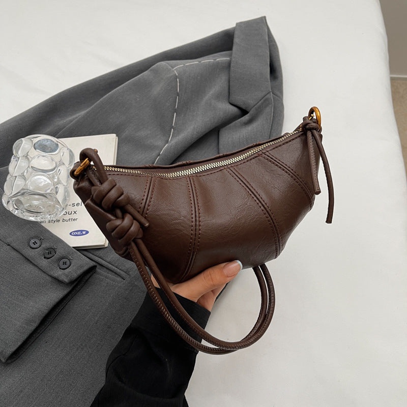 Crossbody cow horn bag