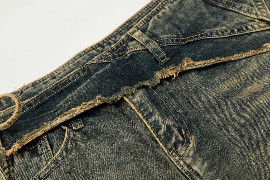 Vintage distressed irregular jeans