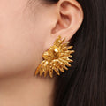 Geometric earrings with wrinkled texture