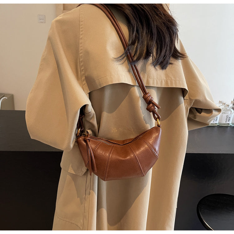 Crossbody cow horn bag