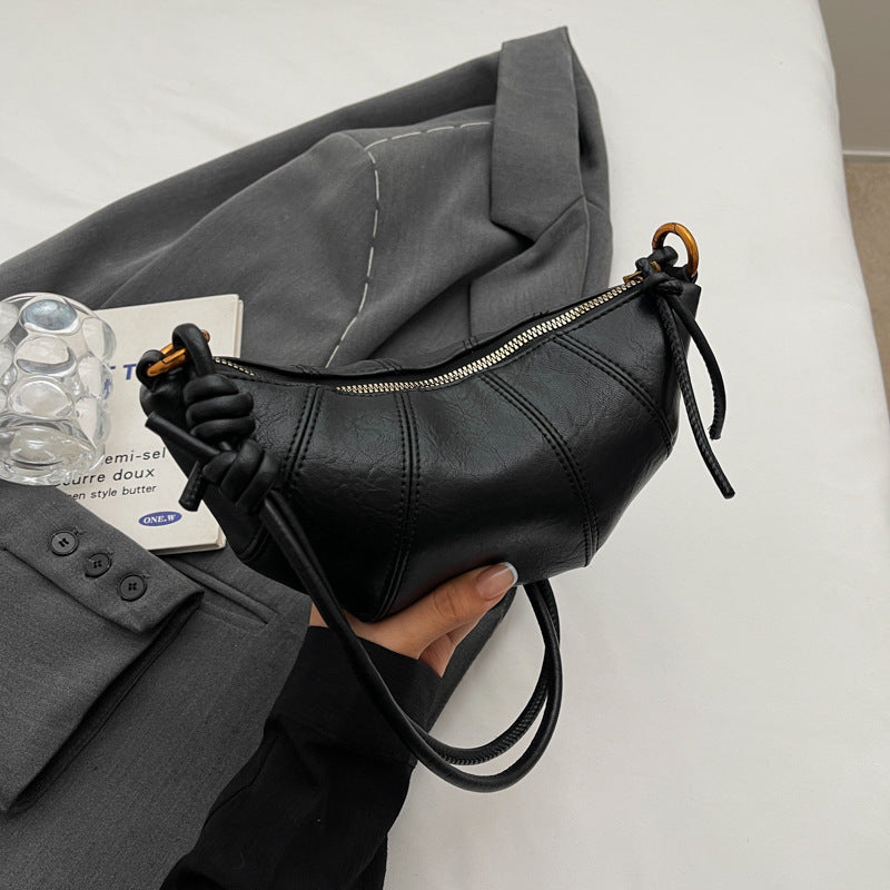 Crossbody cow horn bag
