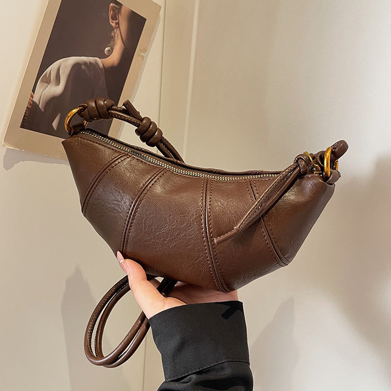 Crossbody cow horn bag