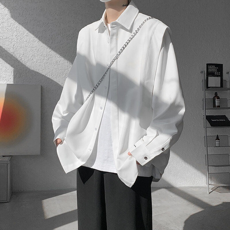 Two shoulder padded long sleeved shirts