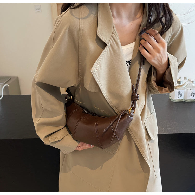 Crossbody cow horn bag