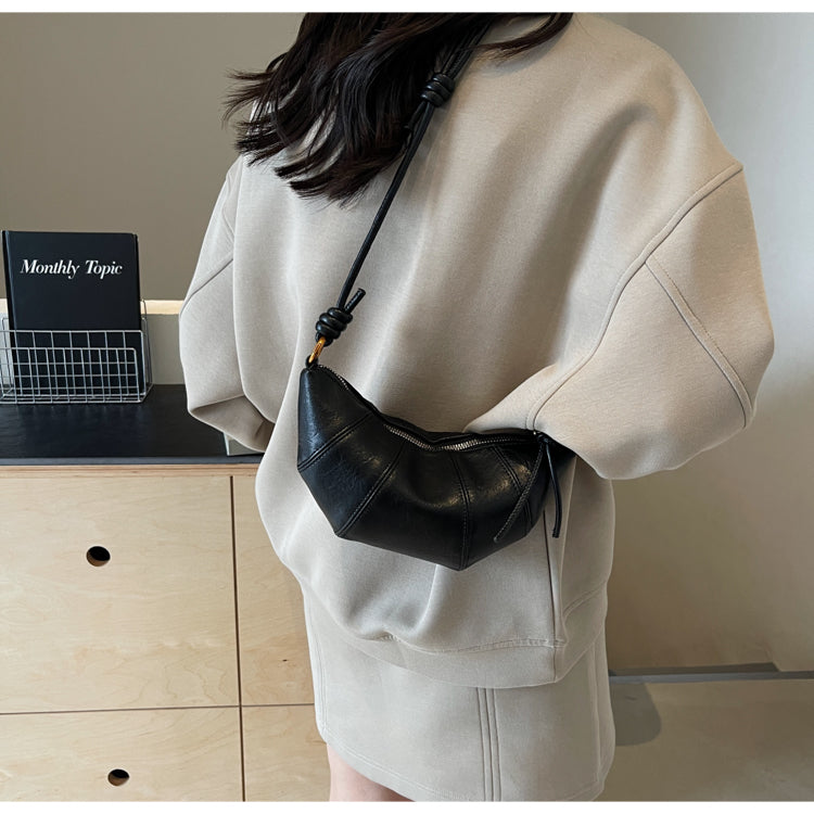 Crossbody cow horn bag